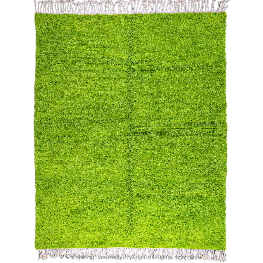 Solid green handmade Moroccan wool rug with white fringe, custom Beni Ourain carpet