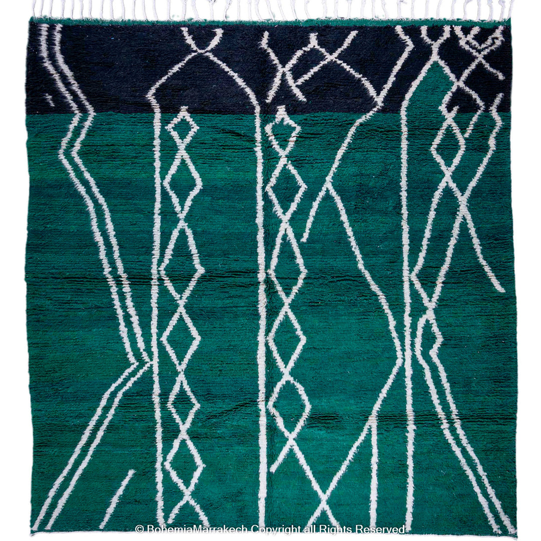 Green Moroccan rug with white tribal diamond lines and navy border, handmade in Beni Ourain wool style