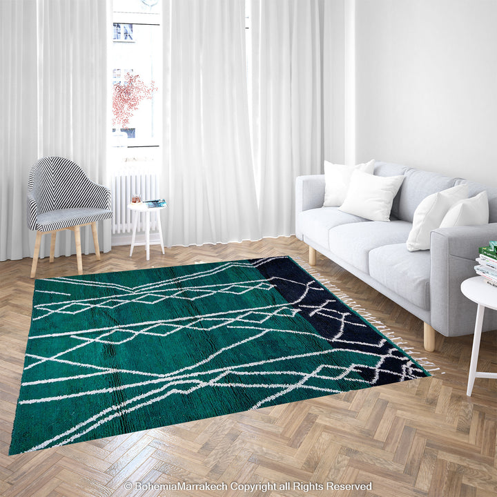 Green Moroccan rug with white tribal diamond lines and navy border, handmade in Beni Ourain wool style