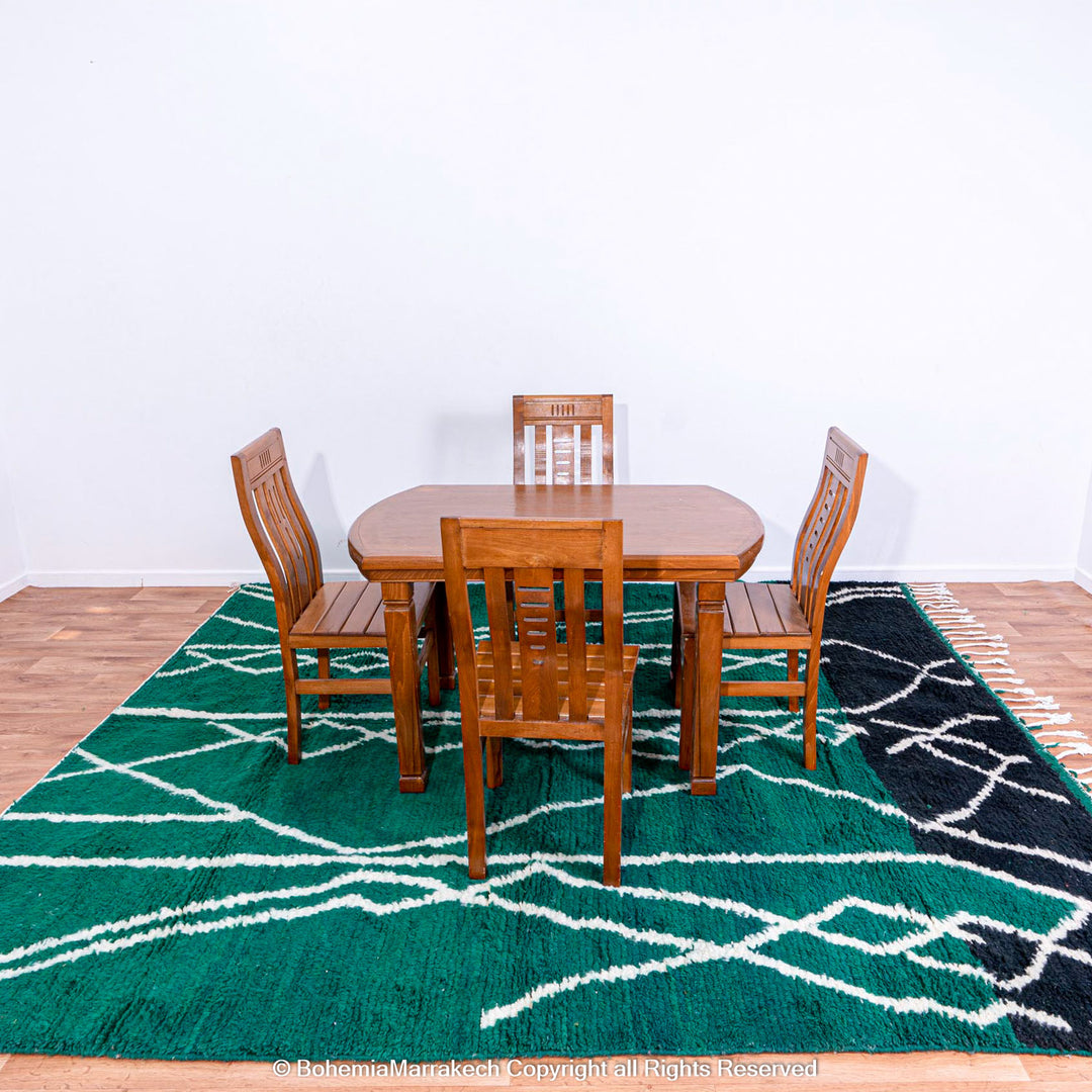 Green Moroccan rug with white tribal diamond lines and navy border, handmade in Beni Ourain wool style