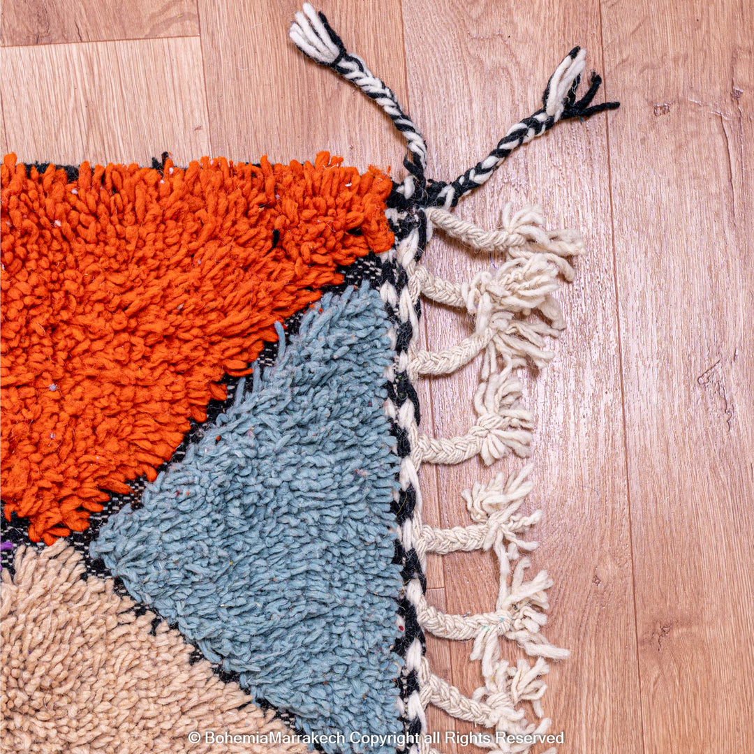 Handmade colorful Moroccan rug with diamond pattern