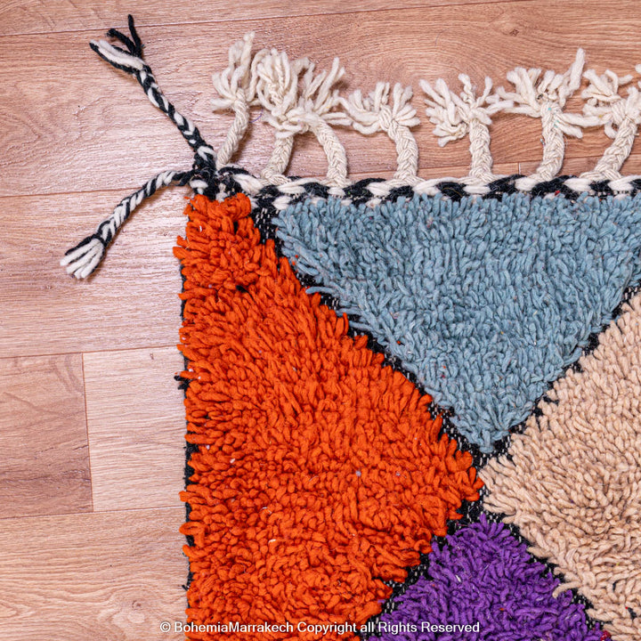 Handmade colorful Moroccan rug with diamond pattern