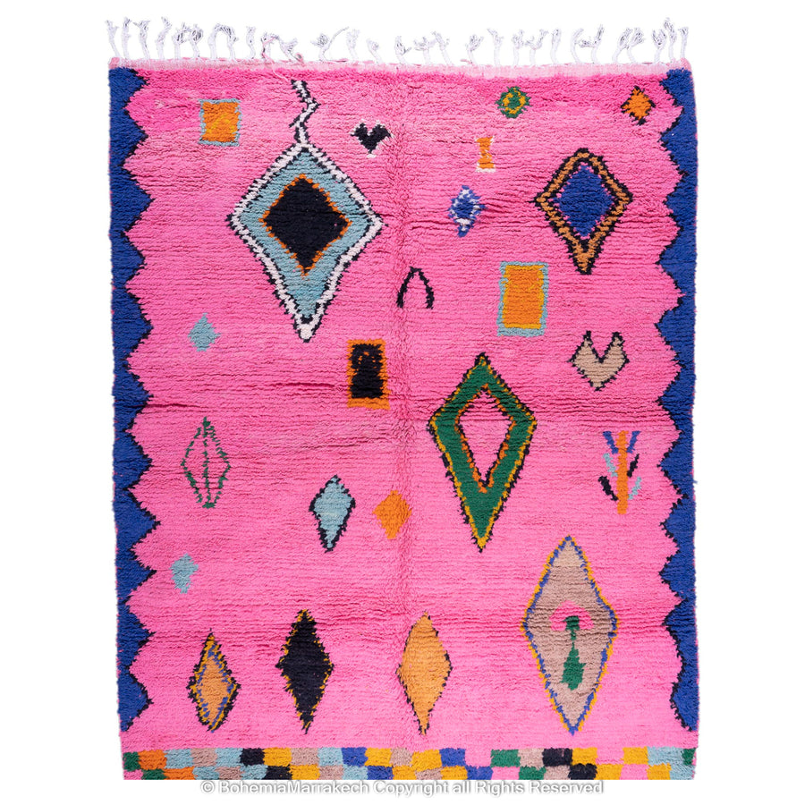 Handmade pink Moroccan rug with colorful geometric Berber motifs