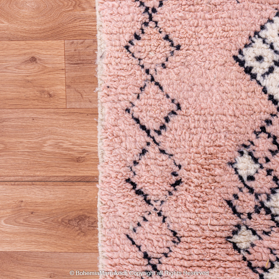 Pink Boujaad Moroccan rug with handwoven diamond tribal motifs in natural wool