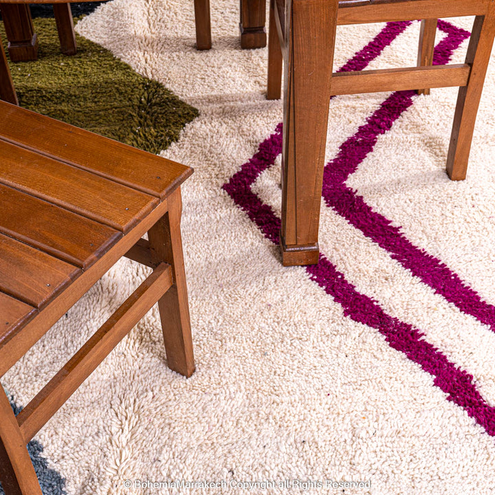 Handmade multicolored Moroccan wool rug with abstract geometric design