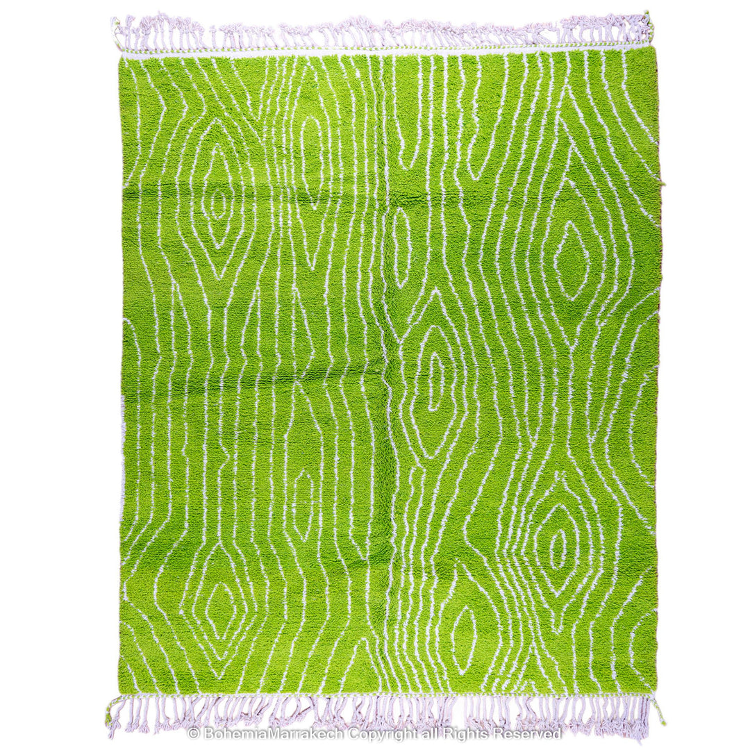 Green Moroccan wool rug with organic line patterns, handmade by Berber artisans