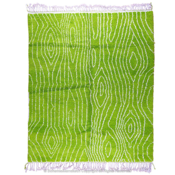 Green Moroccan wool rug with organic line patterns, handmade by Berber artisans