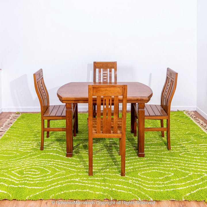 Green Moroccan wool rug with organic line patterns, handmade by Berber artisans