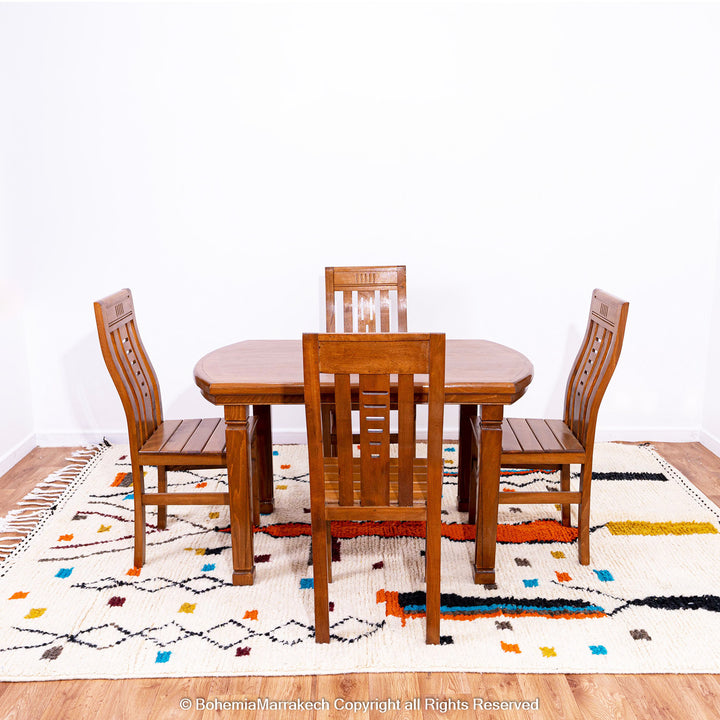 Abstract multicolored Azilal Moroccan rug with bold orange and yellow Berber motifs on wool background – handmade boho carpet