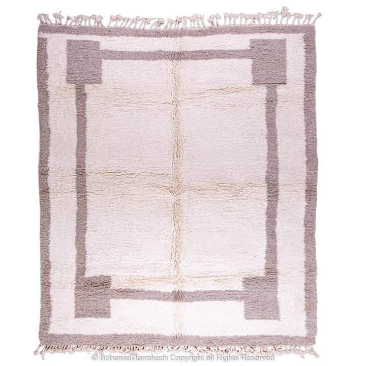 Minimalist Moroccan wool rug with beige border design on cream background