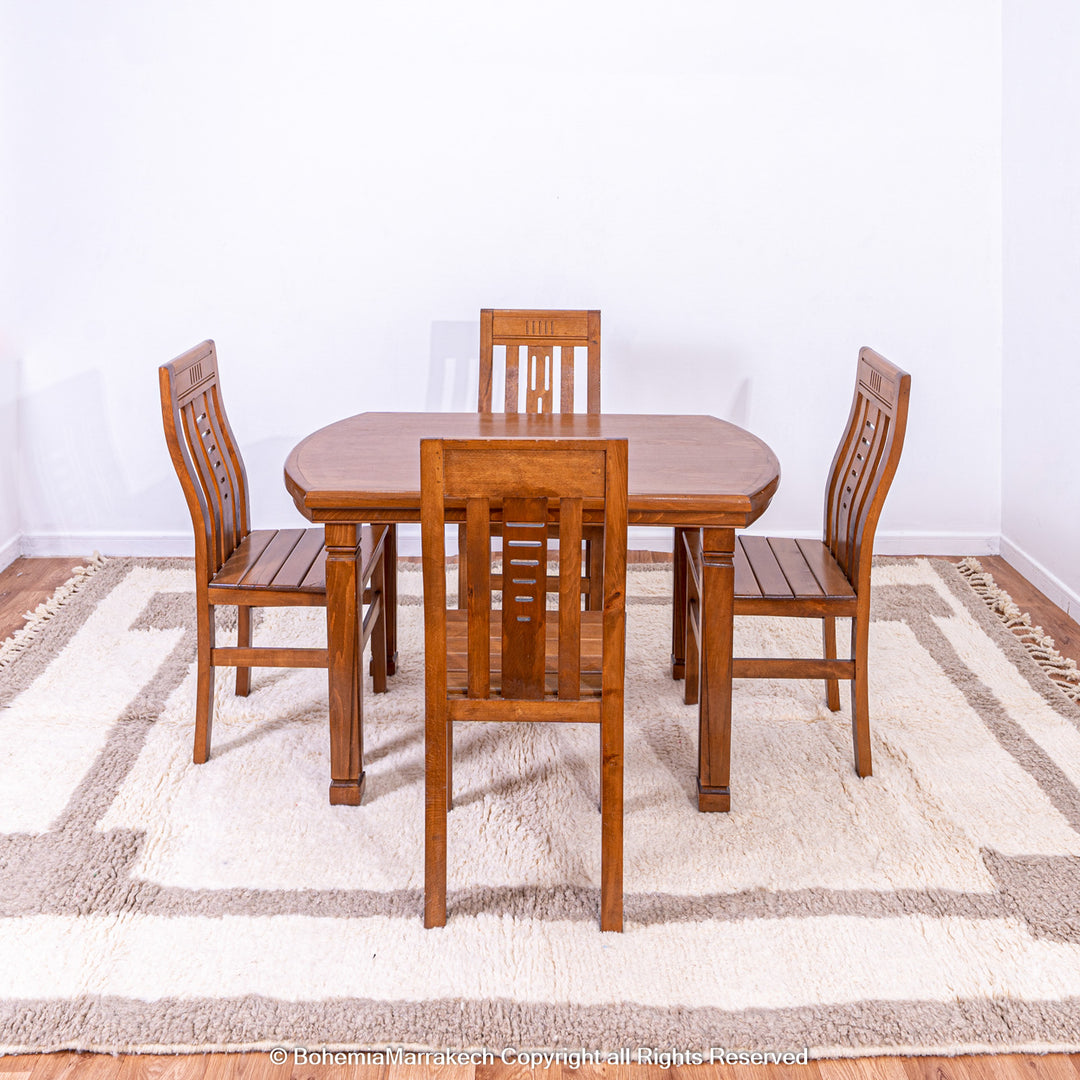 Minimalist Moroccan wool rug with beige border design on cream background