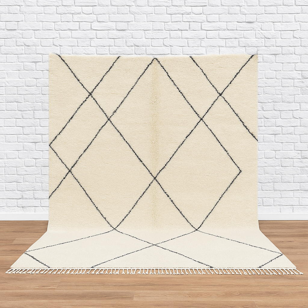 Beige rug with black geometric pattern on a wooden floor and white brick wall background