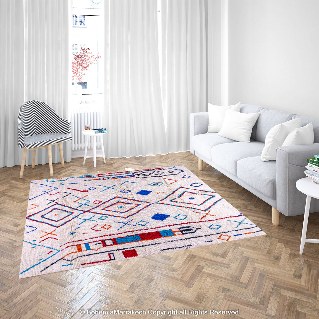 Colorful Azilal Moroccan rug with geometric motifs in a modern living room setting.