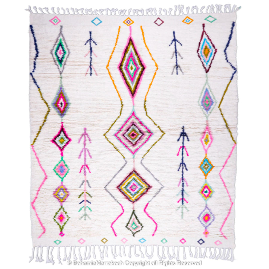 Colorful Moroccan Azilal rug with diamond motifs, handwoven from 100% wool, featuring vibrant pink, blue, and yellow on ivory.