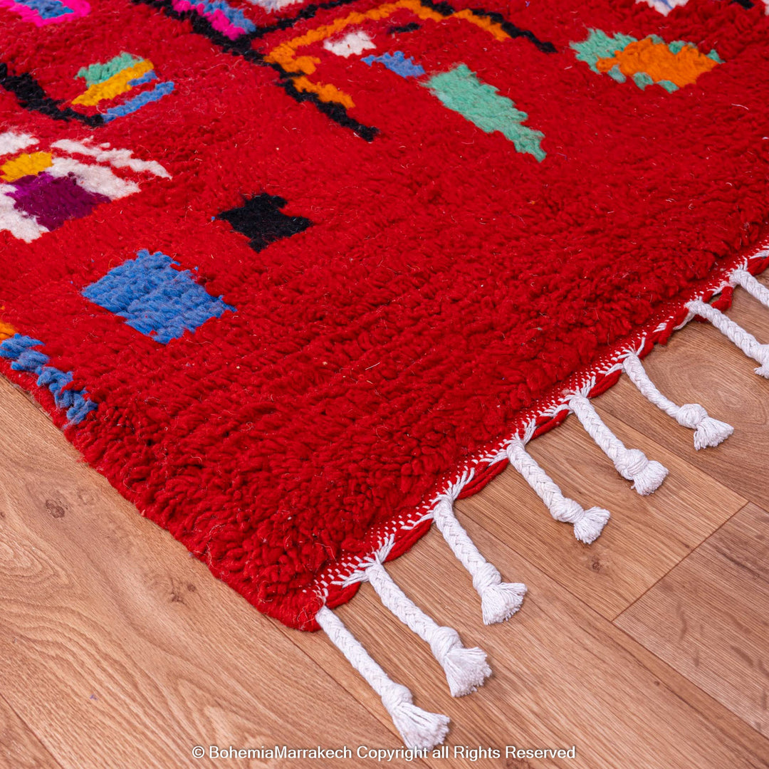 Colorful red Moroccan Boujaad rug with tribal Berber motifs and geometric patterns, handmade in wool