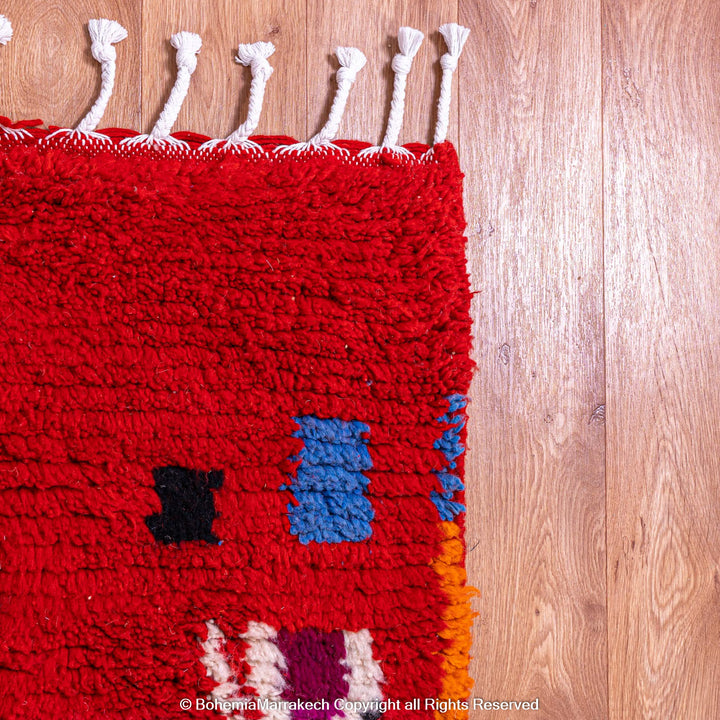 Colorful red Moroccan Boujaad rug with tribal Berber motifs and geometric patterns, handmade in wool