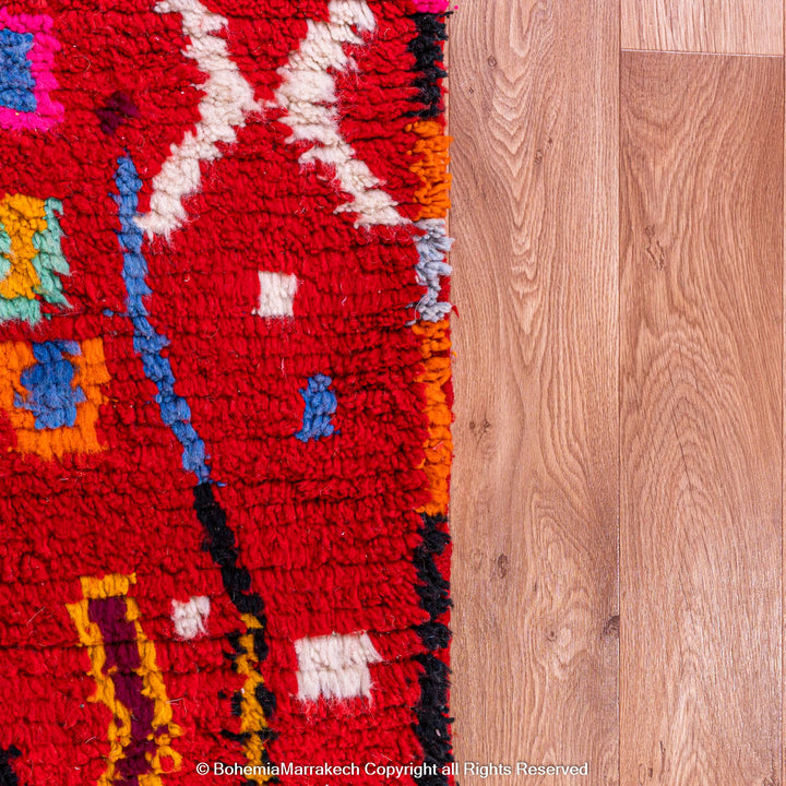 Colorful red Moroccan Boujaad rug with tribal Berber motifs and geometric patterns, handmade in wool
