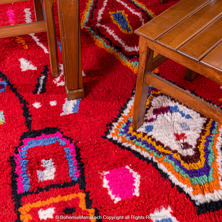 Colorful red Moroccan Boujaad rug with tribal Berber motifs and geometric patterns, handmade in wool