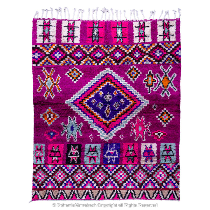 Colorful Boujad Moroccan rug with pink and purple wool, tribal diamond motifs, and Amazigh symbols. Handmade Berber carpet from Morocco.