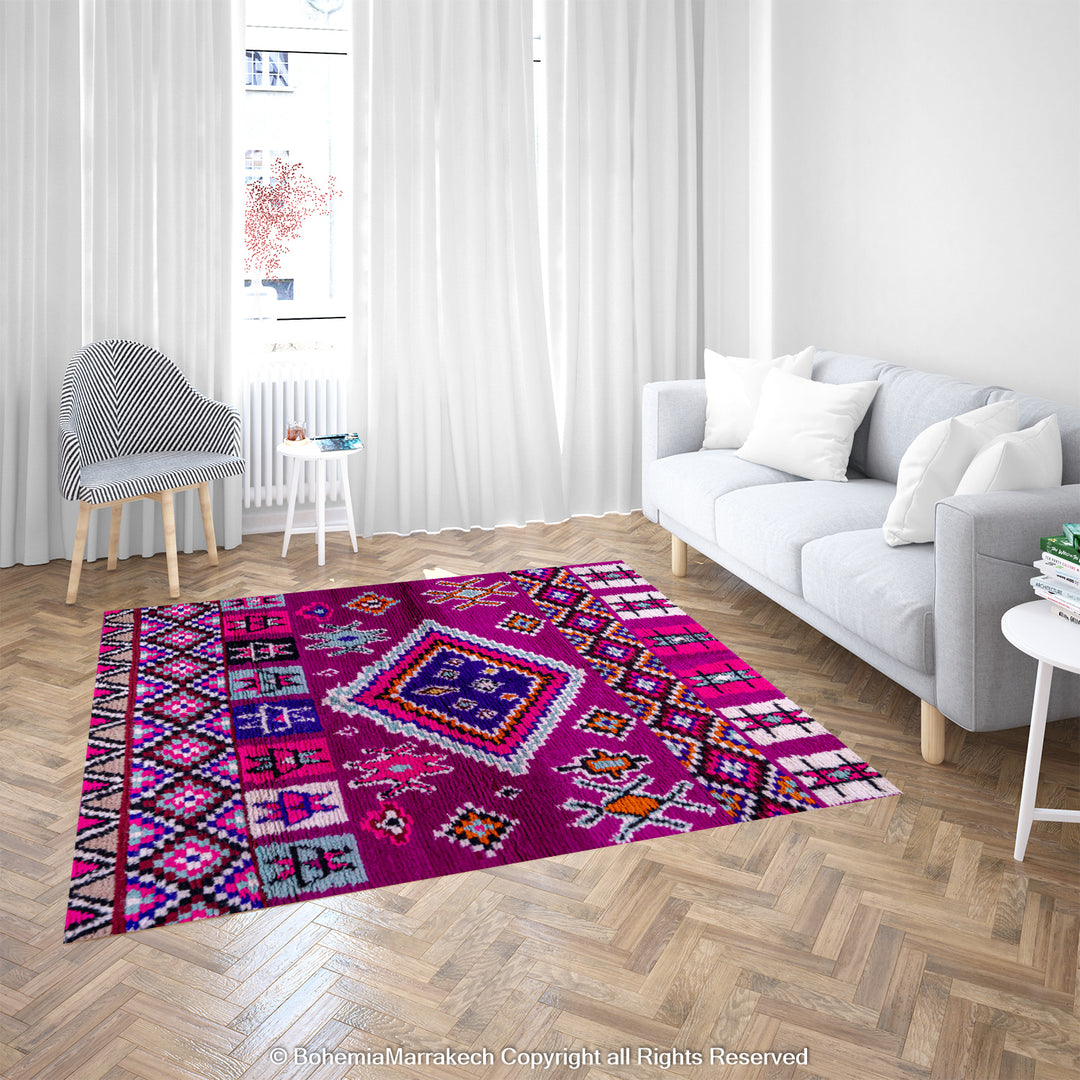 Colorful Boujad Moroccan rug in pink and purple with tribal designs, handmade by Berber artisans, 100% wool, living room decor.