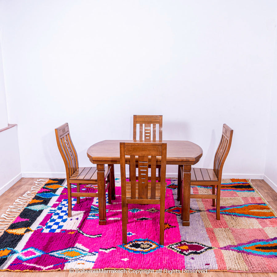 Pink abstract Moroccan wool rug with tribal and checkerboard motifs