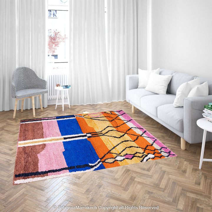 Handmade multicolor Moroccan wool rug with abstract geometric shapes in orange, blue, pink, and brown tones