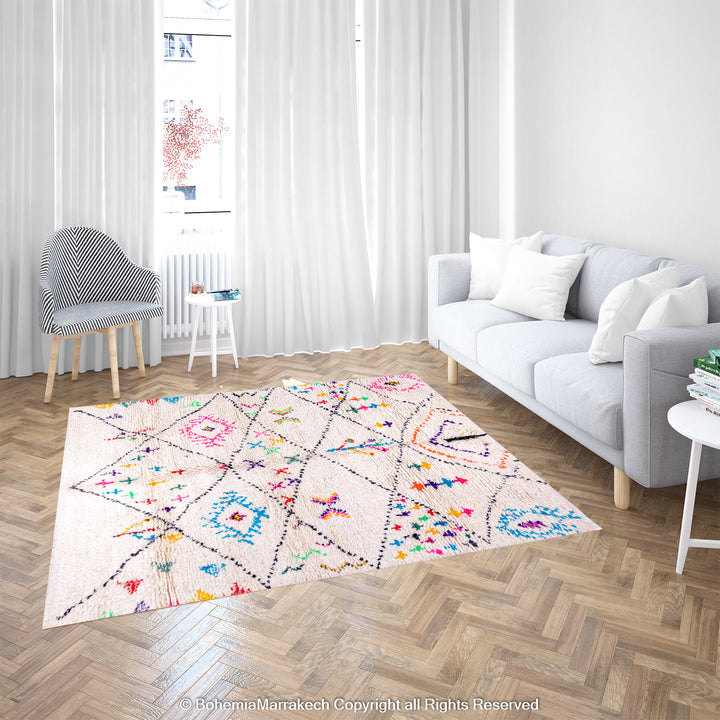 White Moroccan wool rug with multicolor tribal symbols and diamond pattern