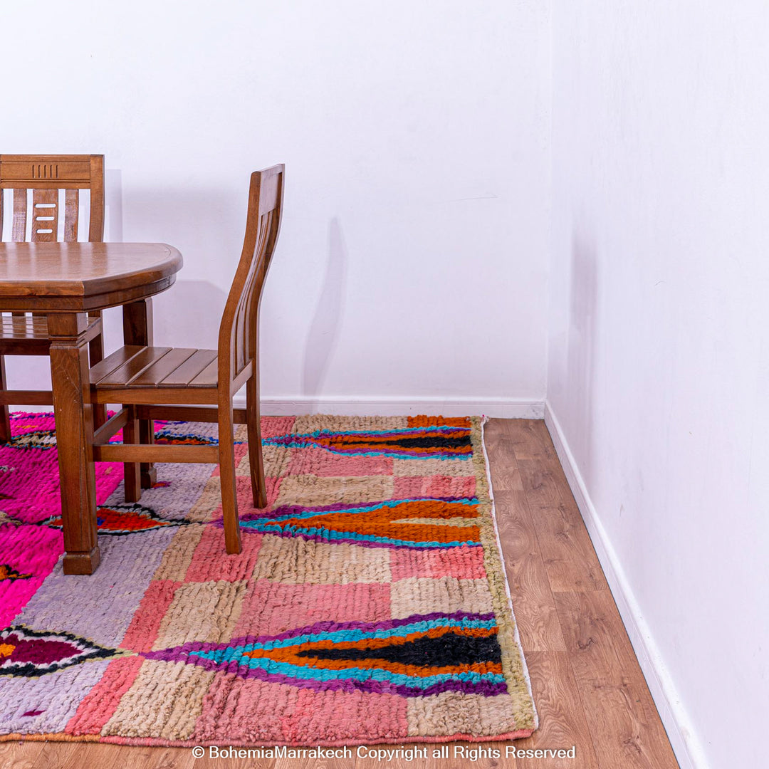 Pink abstract Moroccan wool rug with tribal and checkerboard motifs