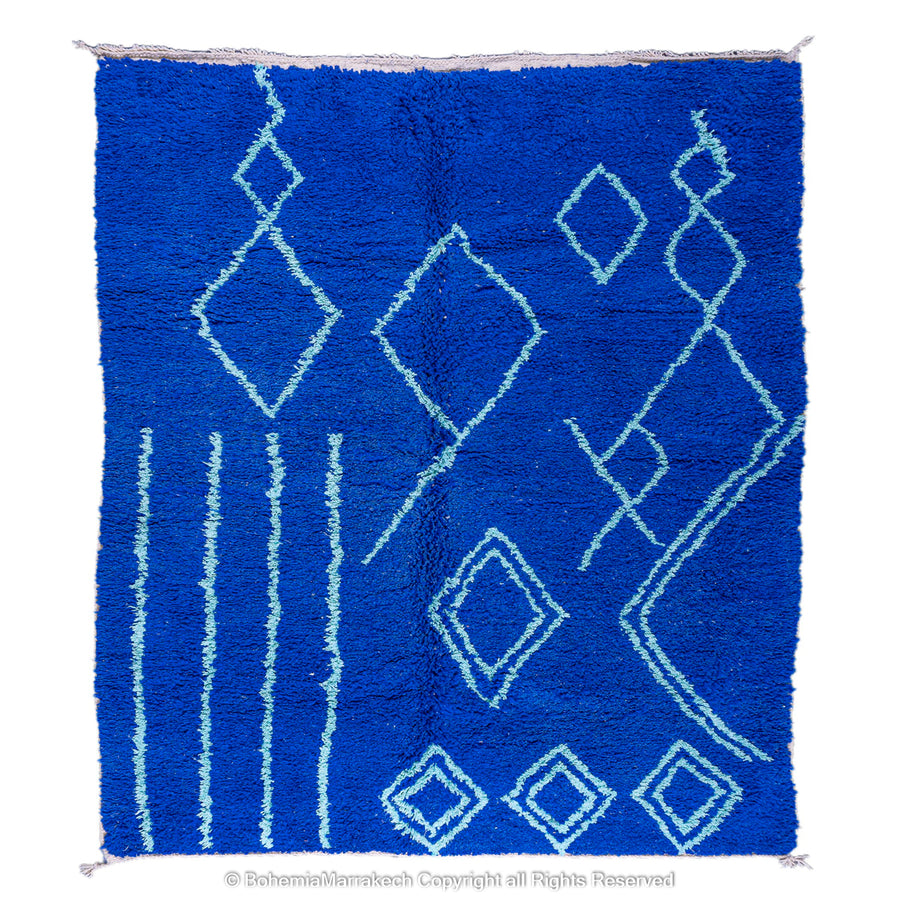 Blue Moroccan wool rug with handwoven Berber diamond pattern