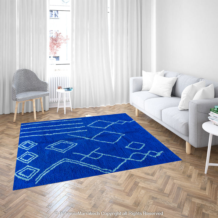 Blue Moroccan wool rug with handwoven Berber diamond pattern