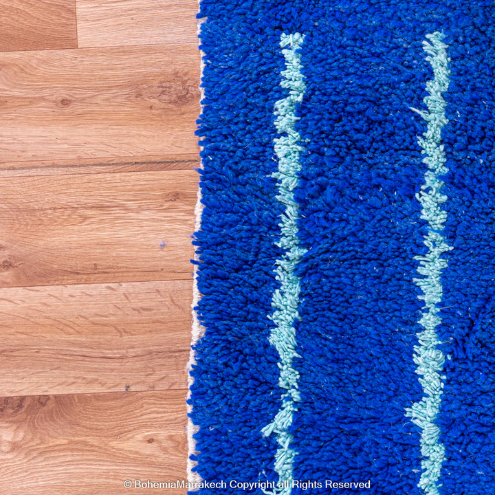 Blue Moroccan wool rug with handwoven Berber diamond pattern