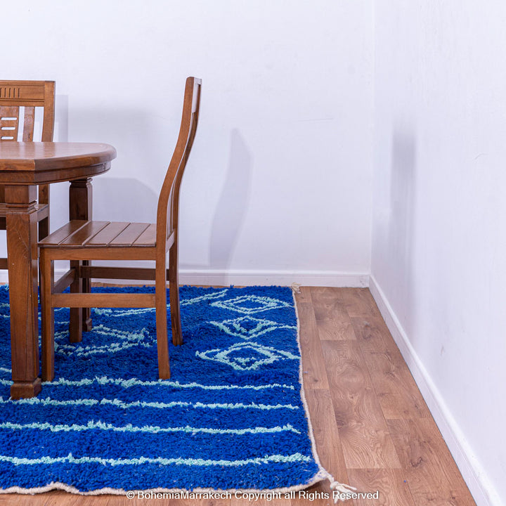 Blue Moroccan wool rug with handwoven Berber diamond pattern