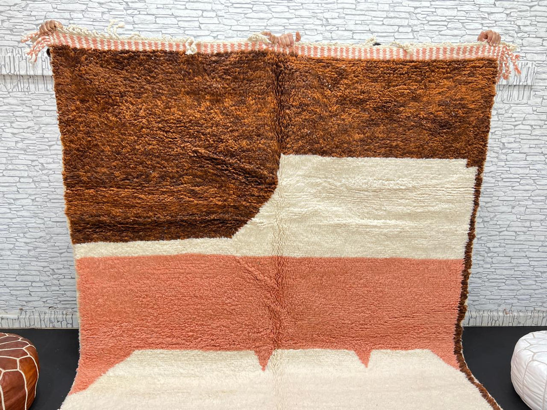 Earth tone Moroccan wool rug with brown, terracotta, and cream geometric design