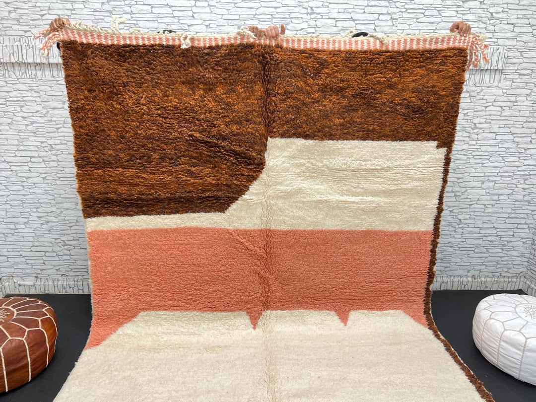 Earth tone Moroccan wool rug with brown, terracotta, and cream geometric design