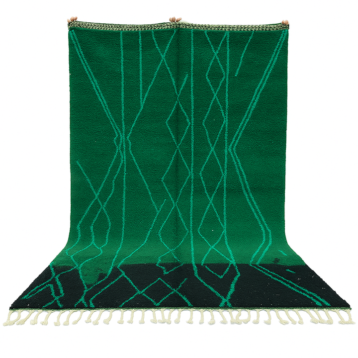 Emerald green Moroccan wool rug with diamond pattern, handmade by Berber artisans in Morocco
