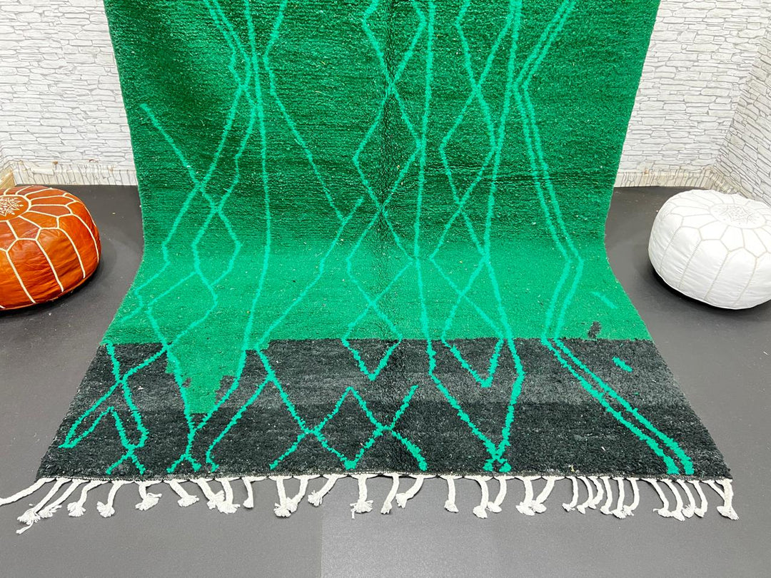 Emerald green Moroccan wool rug with diamond pattern, handmade by Berber artisans in Morocco