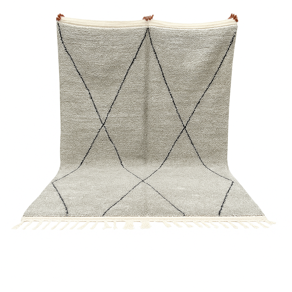 Handwoven gray Moroccan wool rug with black diamond pattern and fringes, handmade by Berber women in the Atlas Mountains