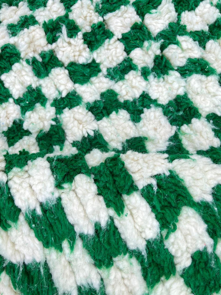 Handwoven green and white checkered Moroccan wool runner rug with tassel edges, handmade by Berber artisans