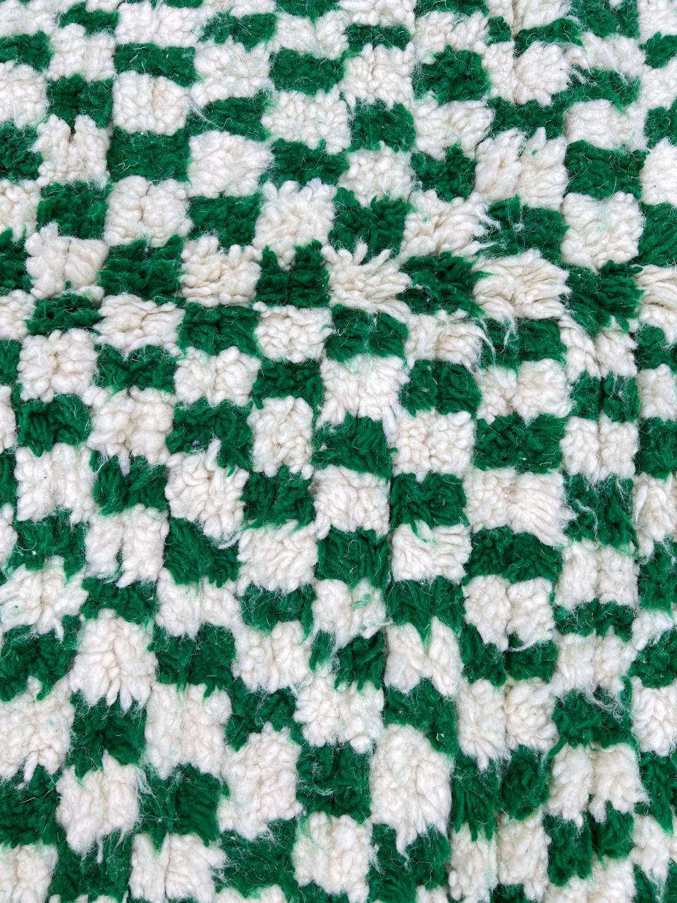Handwoven green and white checkered Moroccan wool runner rug with tassel edges, handmade by Berber artisans