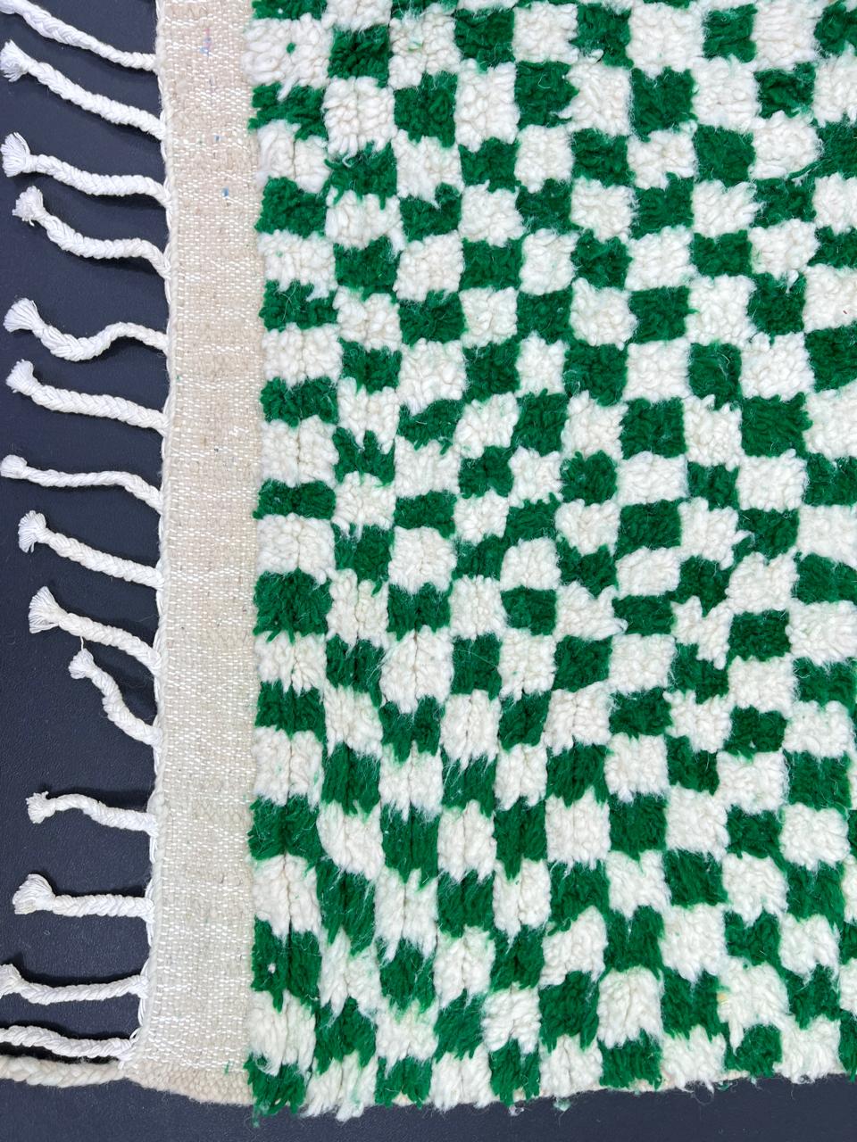 Handwoven green and white checkered Moroccan wool runner rug with tassel edges, handmade by Berber artisans