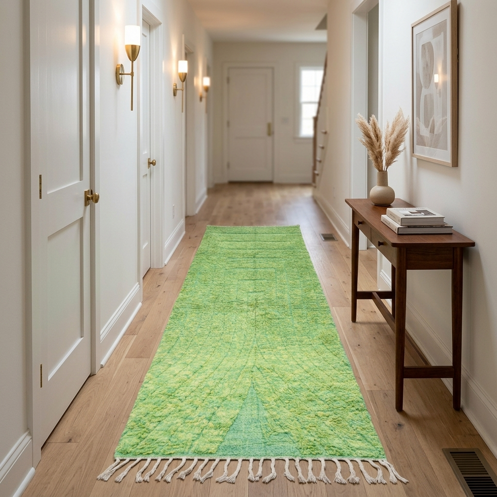 Handwoven green Moroccan wool runner rug with soft tonal textured pattern