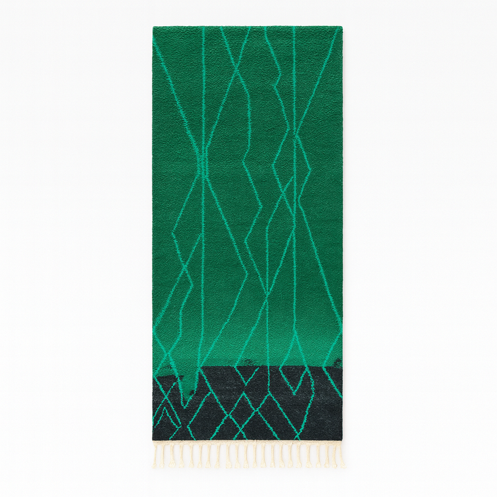 Handwoven green Moroccan wool runner rug with geometric line patterns and black gradient base.