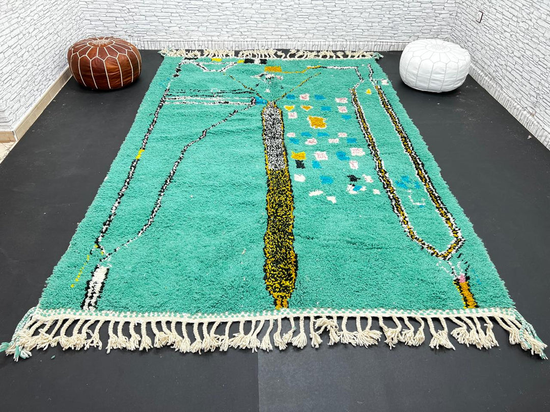 Green Moroccan wool rug with abstract geometric Berber pattern, handmade by artisans