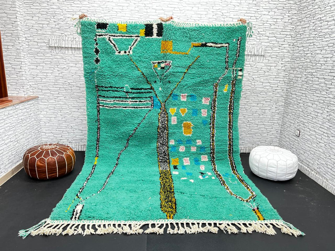 Green Moroccan wool rug with abstract geometric Berber pattern, handmade by artisans