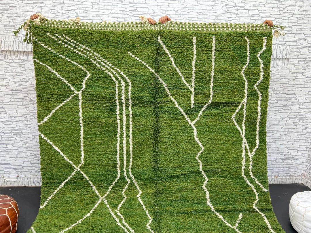 Handwoven green Moroccan wool rug with white geometric line design