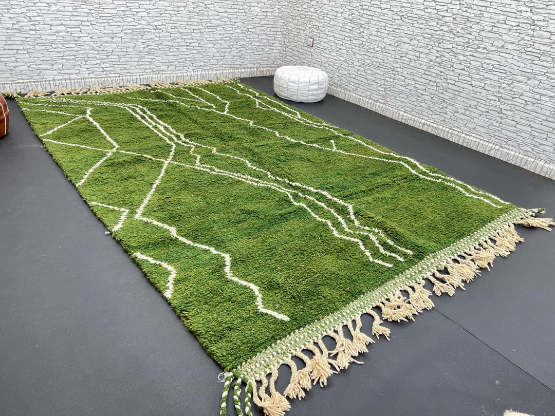 Handwoven green Moroccan wool rug with white geometric line design
