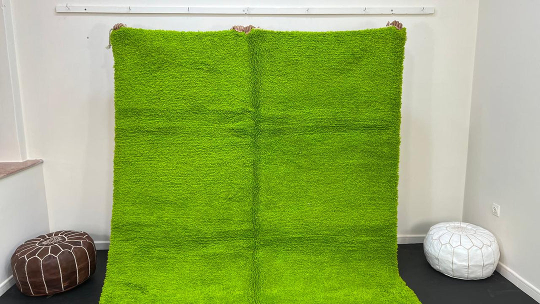 Solid green Moroccan wool rug with plush minimalist Berber texture