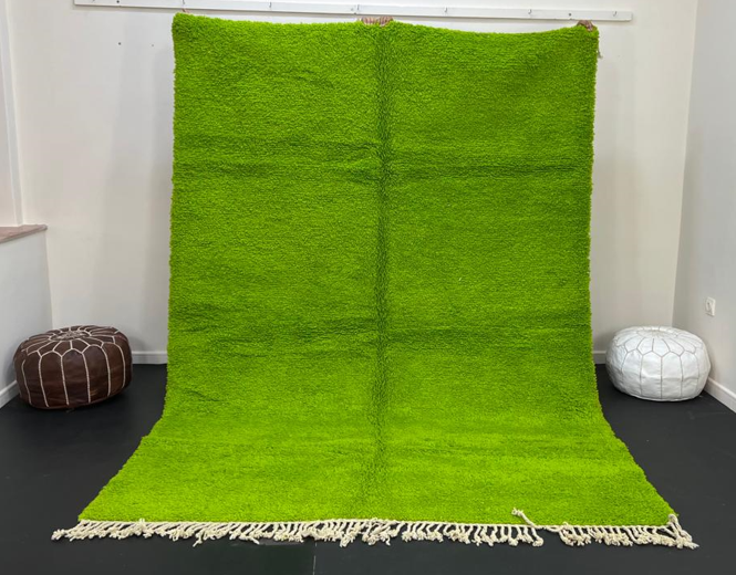Solid green Moroccan wool rug with plush minimalist Berber texture