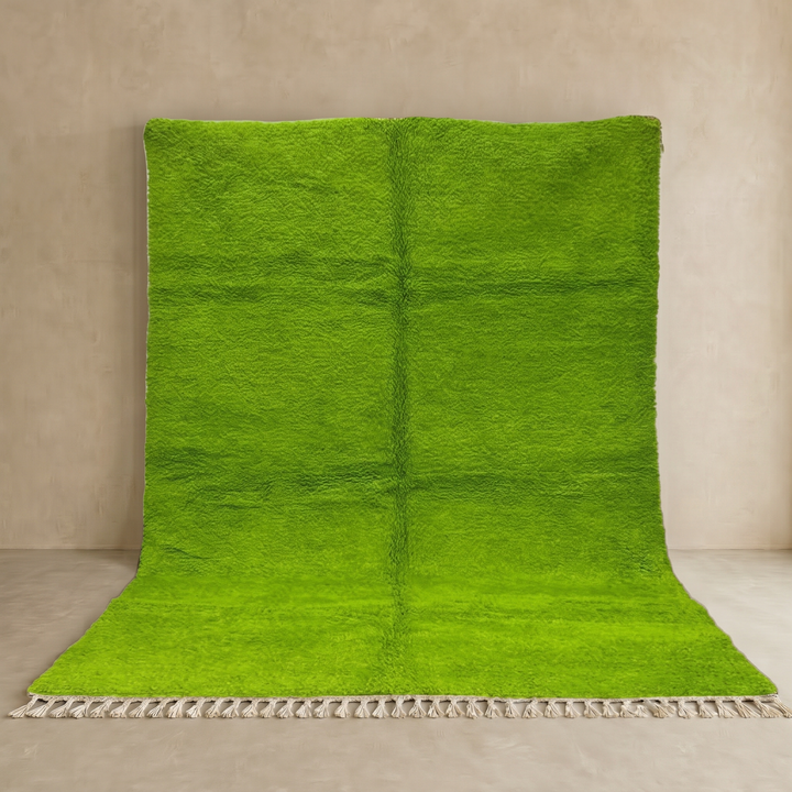 Solid green Moroccan wool rug with plush minimalist Berber texture
