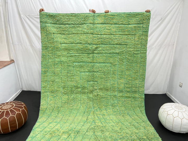 Green Moroccan wool rug with carved geometric lines and sculpted texture